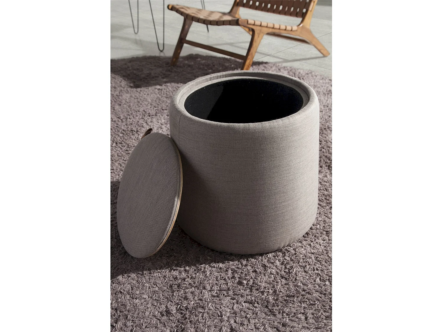 Pouf rembourré tissu avec poignée en cuir