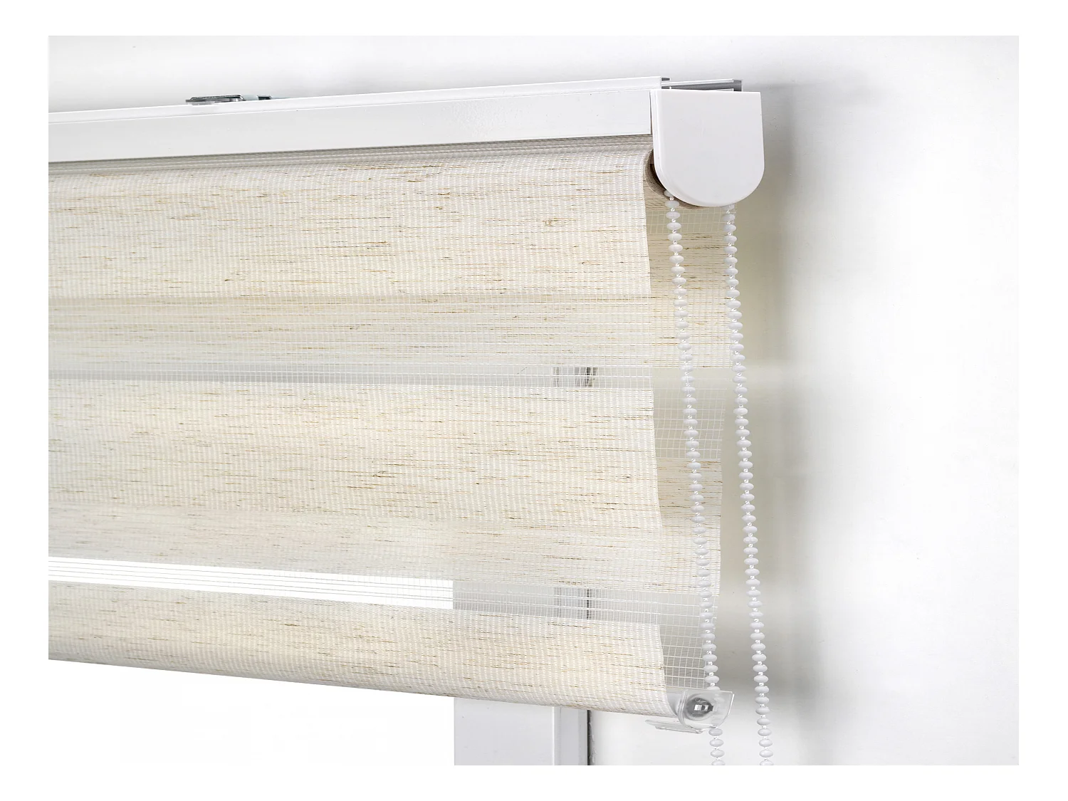 Tweekleurig dag- en nachtrolgordijn met dubbele weving en handketting