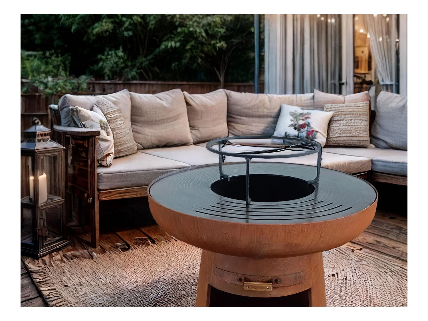 Barbecue rond avec plaque d'acier ronde et grille