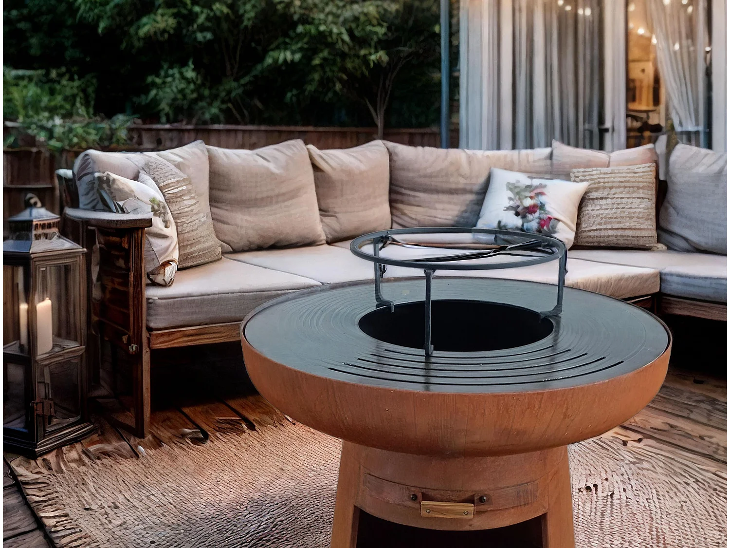 Barbecue rond avec plaque d'acier ronde et grille