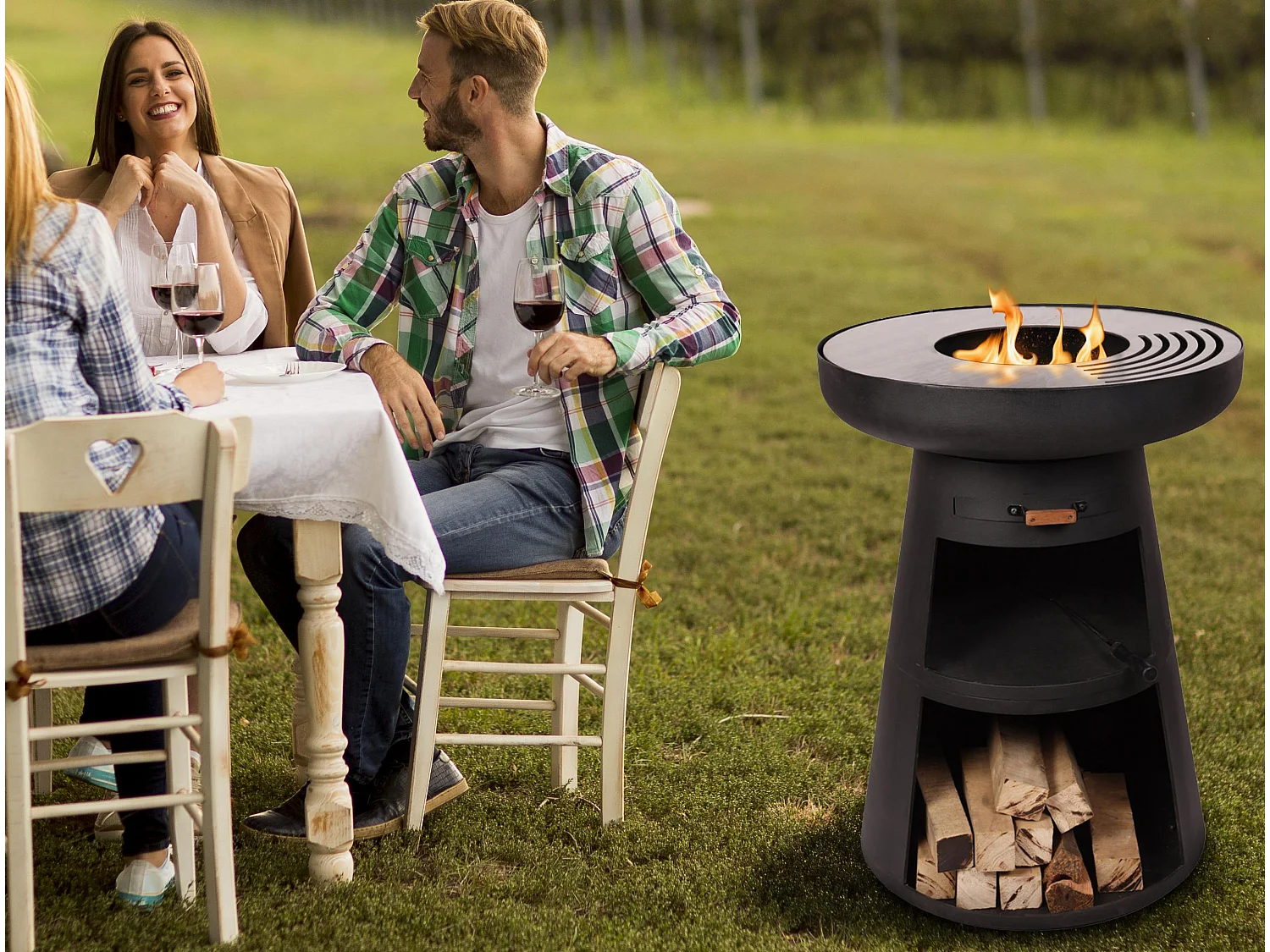 Barbecue rond avec plaque d'acier ronde et grille