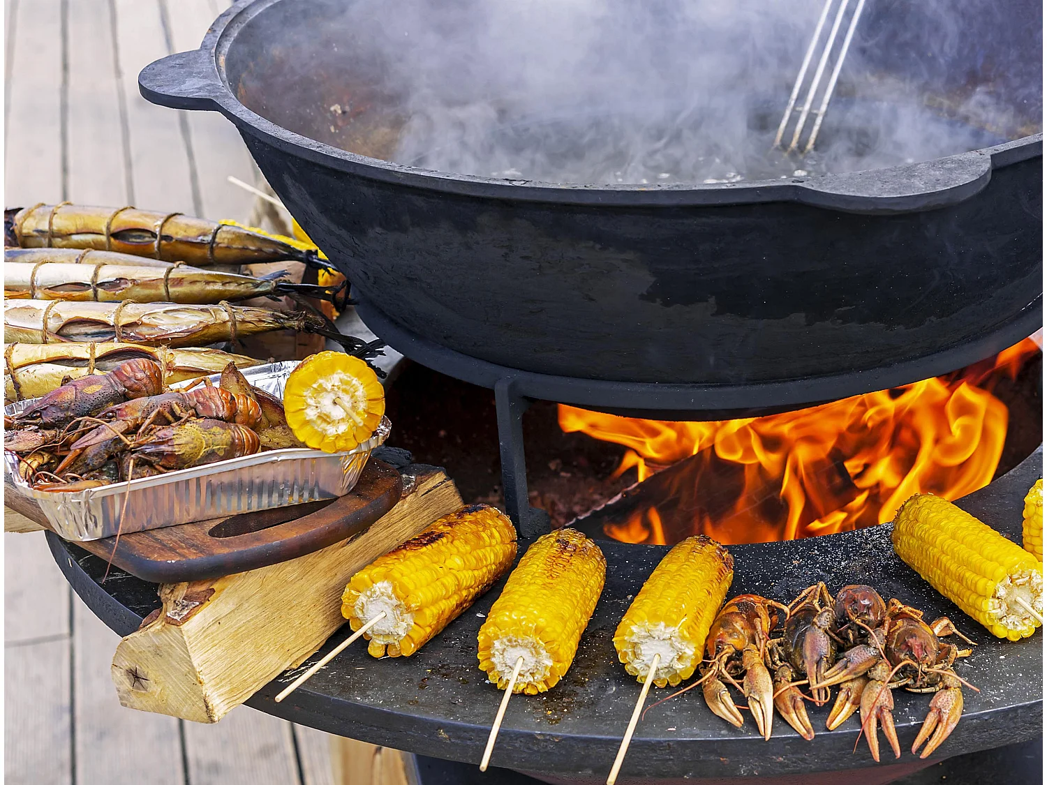 Ronde barbecue met ronde staalplaat en grill