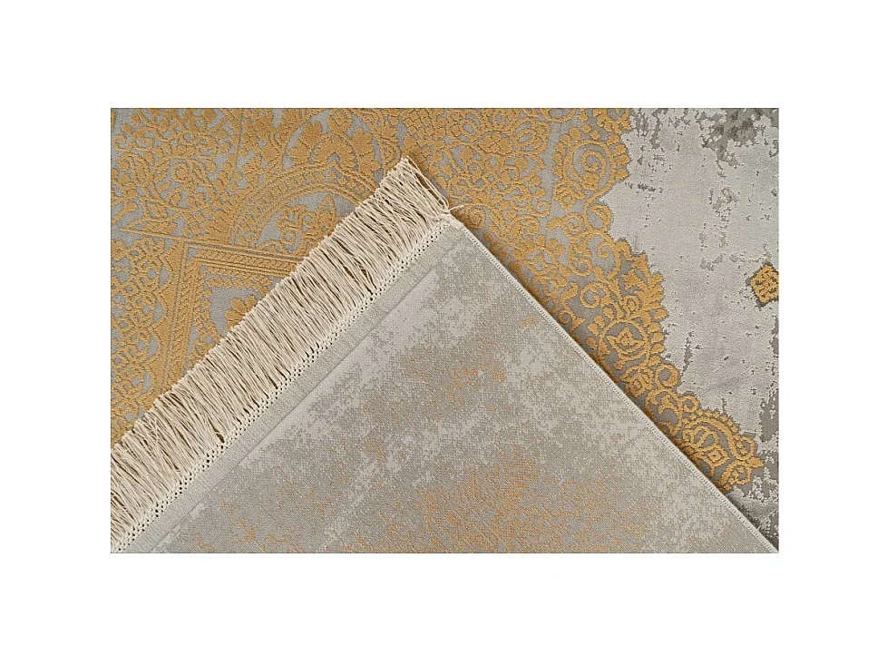 Tapis Pierre Cardin 170x120, design E109E coloris doré - Confort et élégance pour votre intérieur