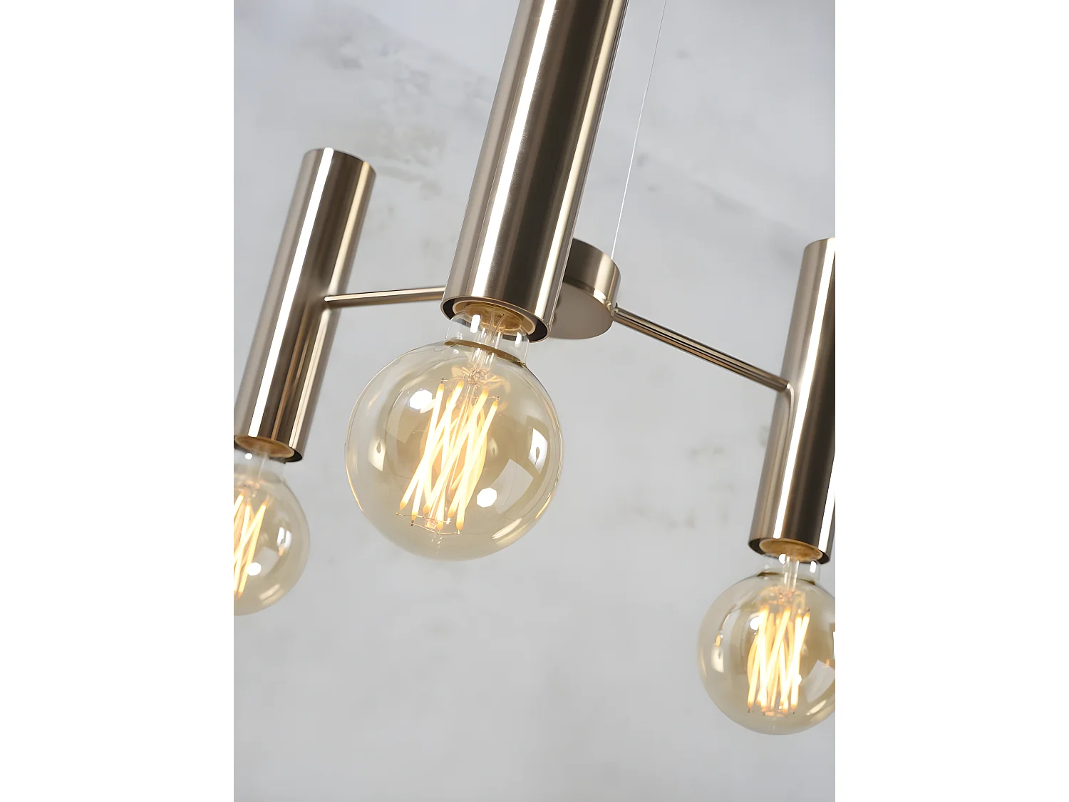 Drievoudige ophanging in goudkleurig metaal