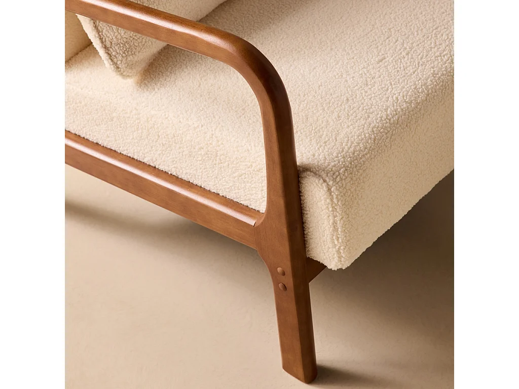 Fauteuil à bouclettes . pieds bois d'hévéa teinté noyer clair. 1 place droit fixe. pieds compas scandinave. structure en bois solide