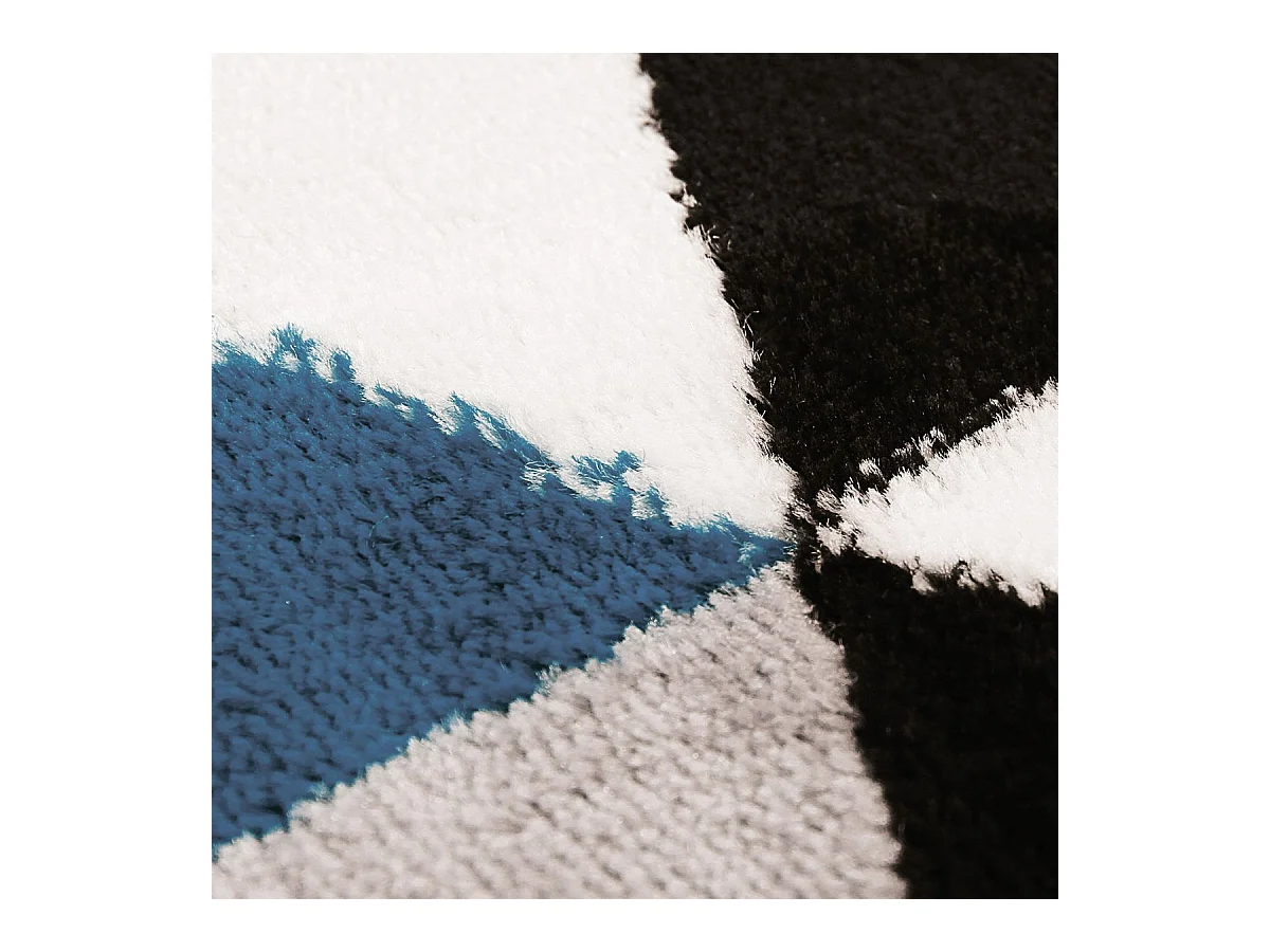 GEO SCANDI - Tapis toucher laineux motif triangles bleu 80x150
