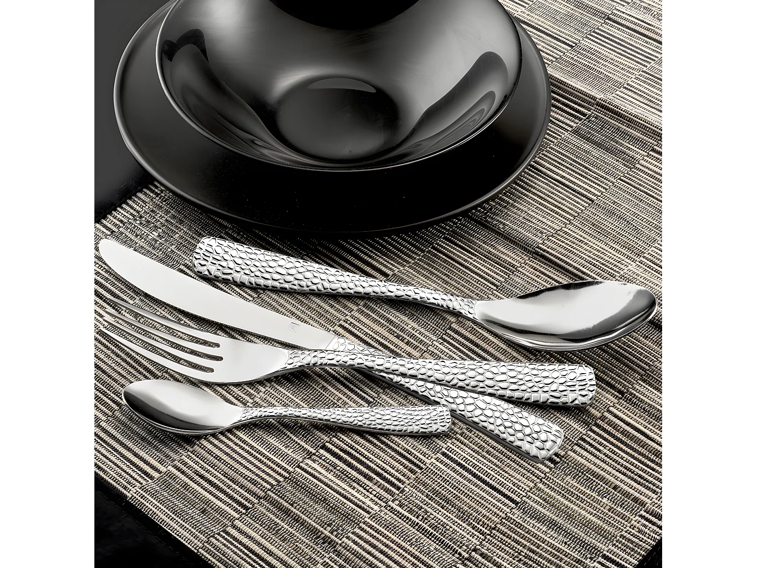Set de 24 cubiertos Tam Tam Amefa mango grabado inox