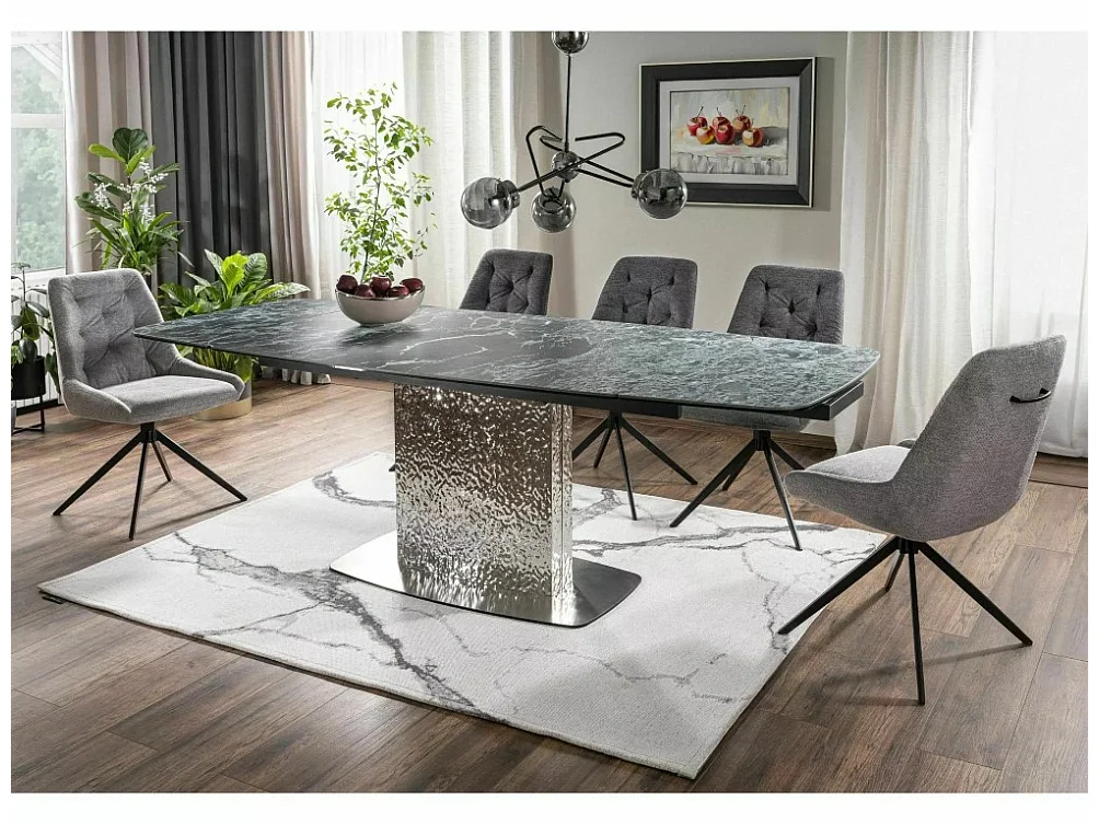 Table design extensible aspect marbre vert avec pied central en acier inoxydable Eglantine