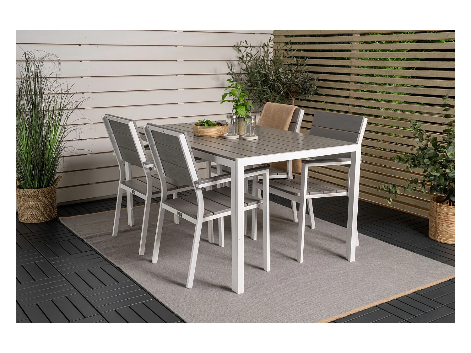 Levels tuinstoel stapelbaar witgrijs.