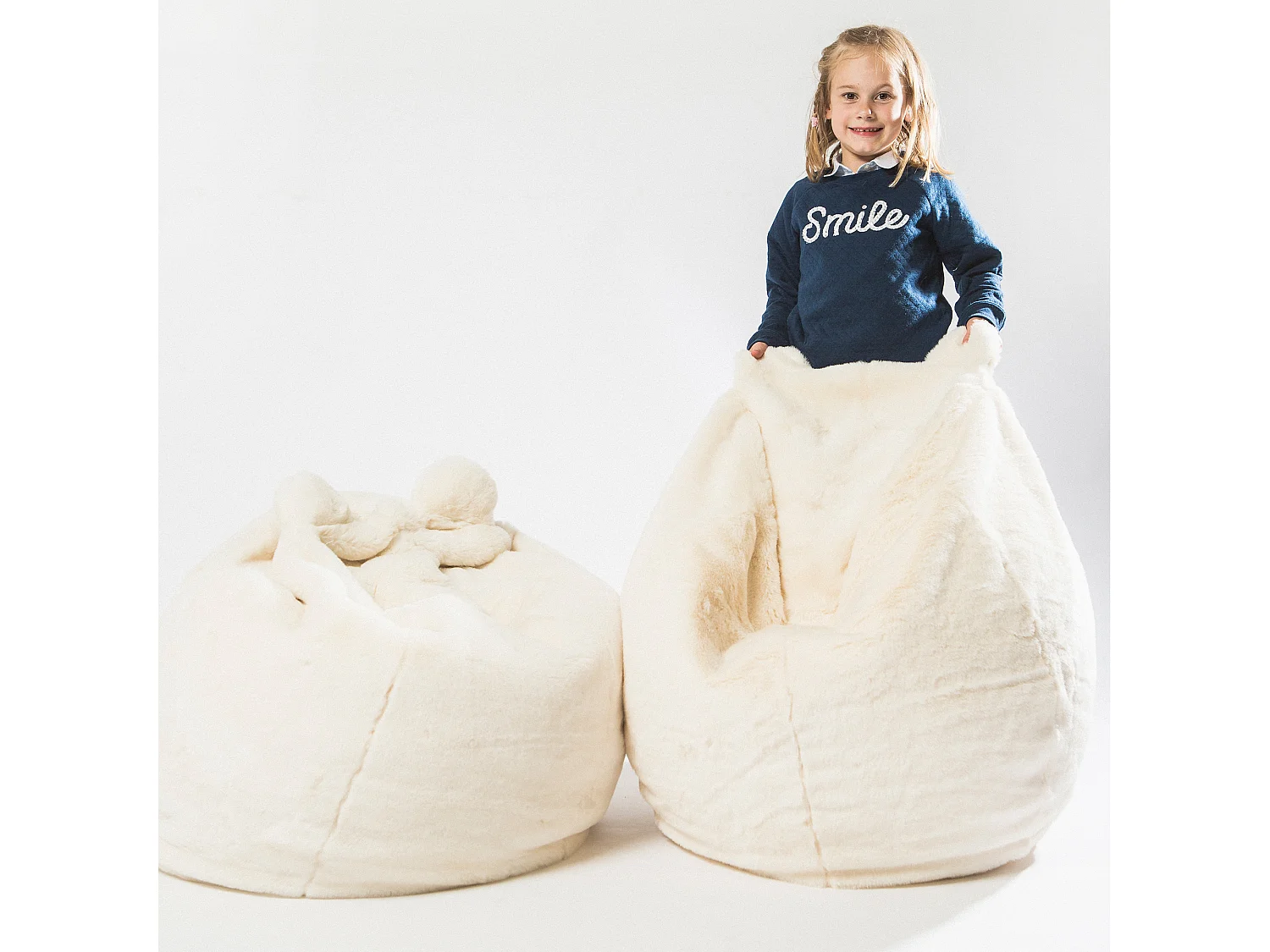 Pouf fausse fourrure et polyester collection SOFT ANIMALS rose avec remplissage