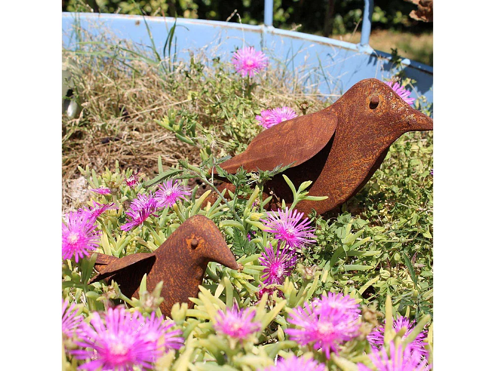 Oiseau décoratif en fer forgé rouillé