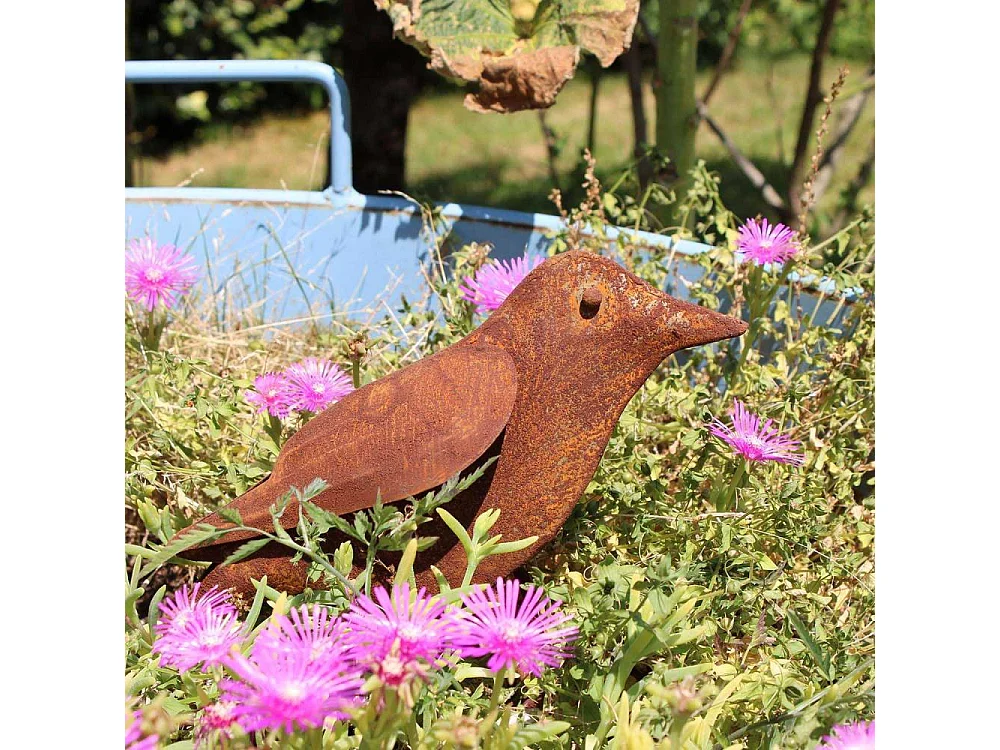 Oiseau décoratif en fer forgé rouillé