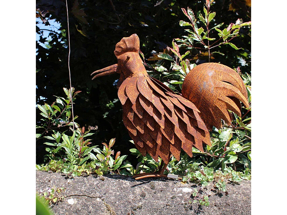Coq en fer forgé rouillé