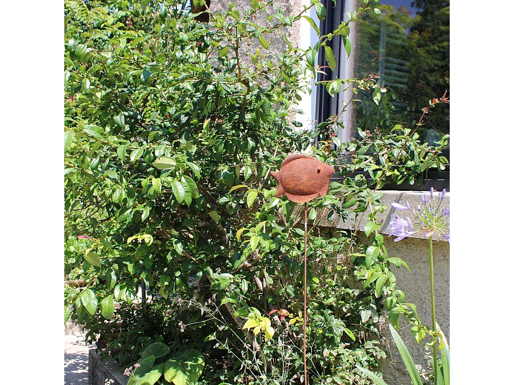 Poisson en fer forgé rouillé sur pic Bob