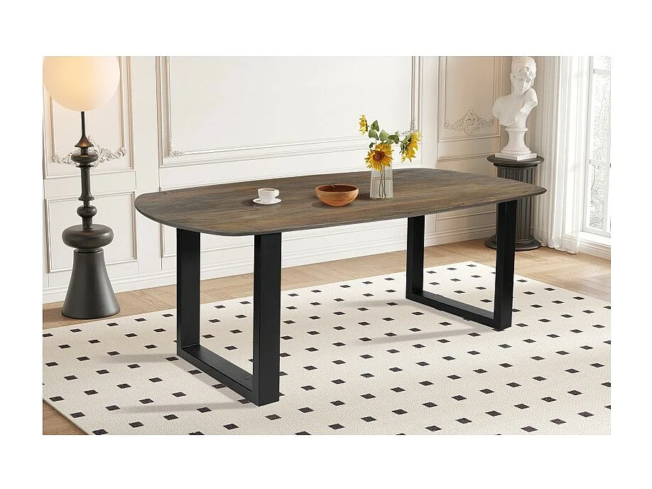 Table à manger ovale 8 personnes en bois massif coloris chêne vieilli collection FRANCHIA. Pieds design en U