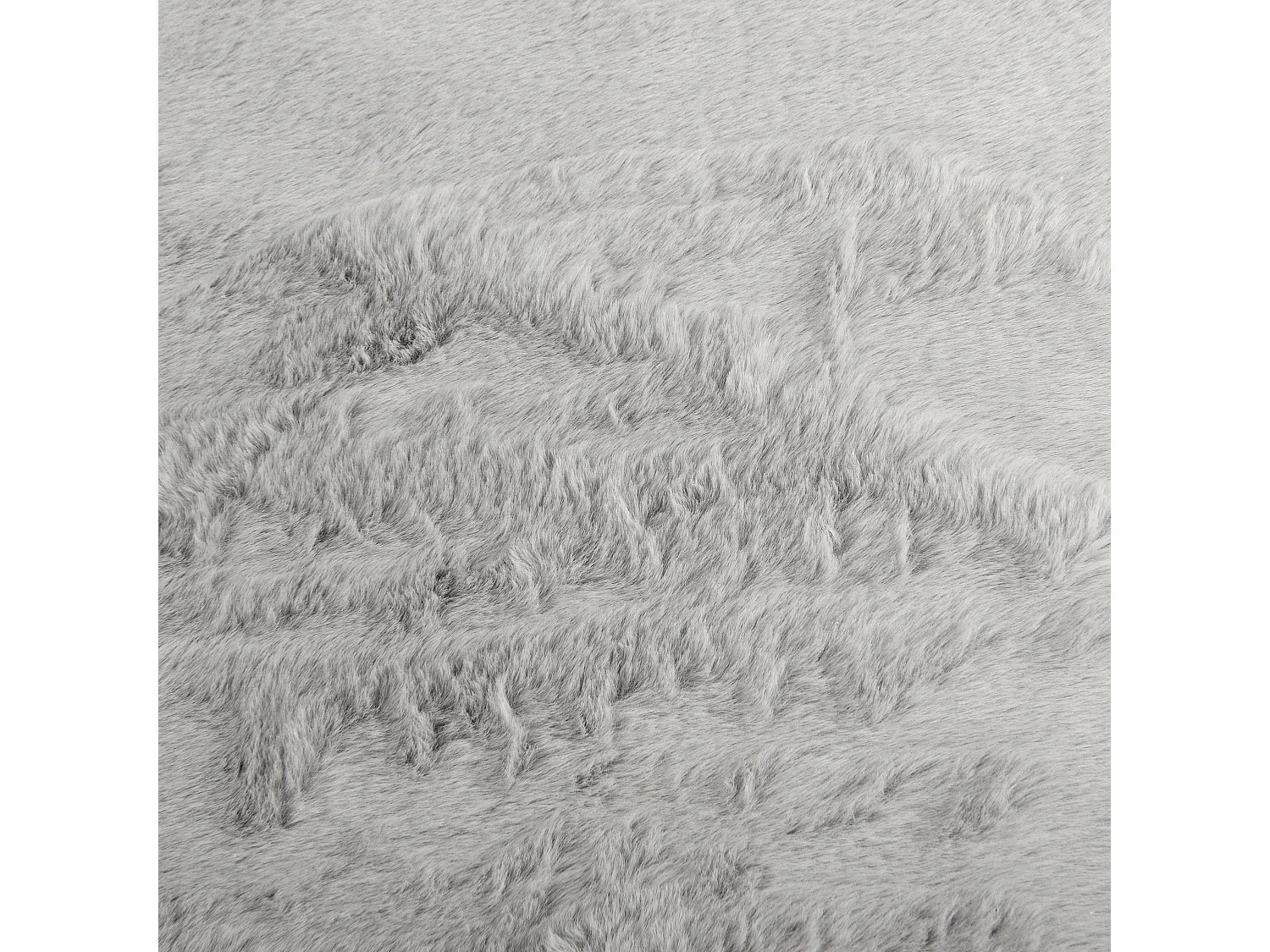 Jeté de canapé Hane en fausse fourrure gris 130x170cm