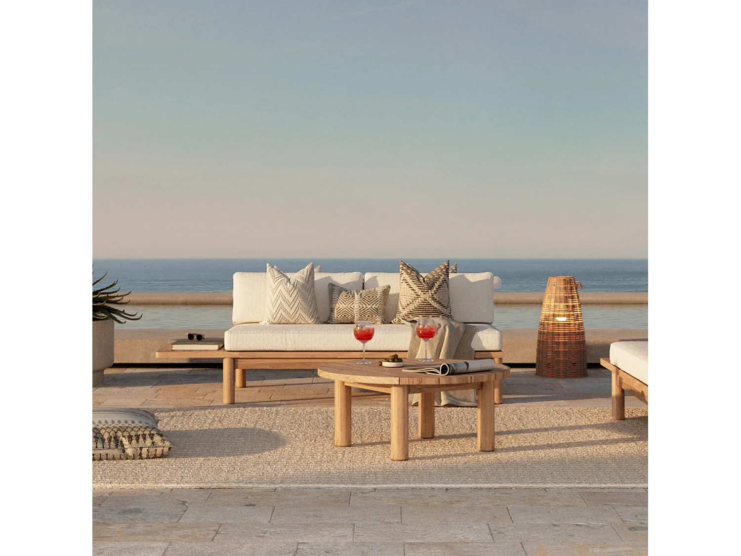 Salon de jardin en teck massif avec un canapé et une table basse ronde - Aurland