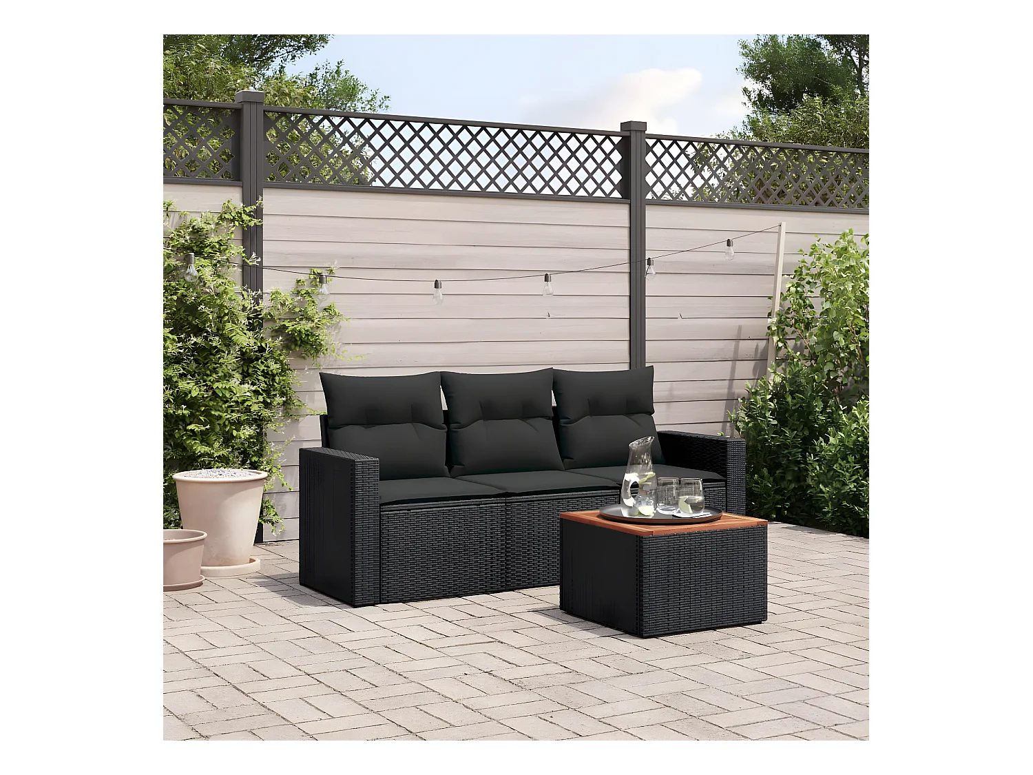 Set Divani da Giardino 4 pz con Cuscini Nero in Polyrattan