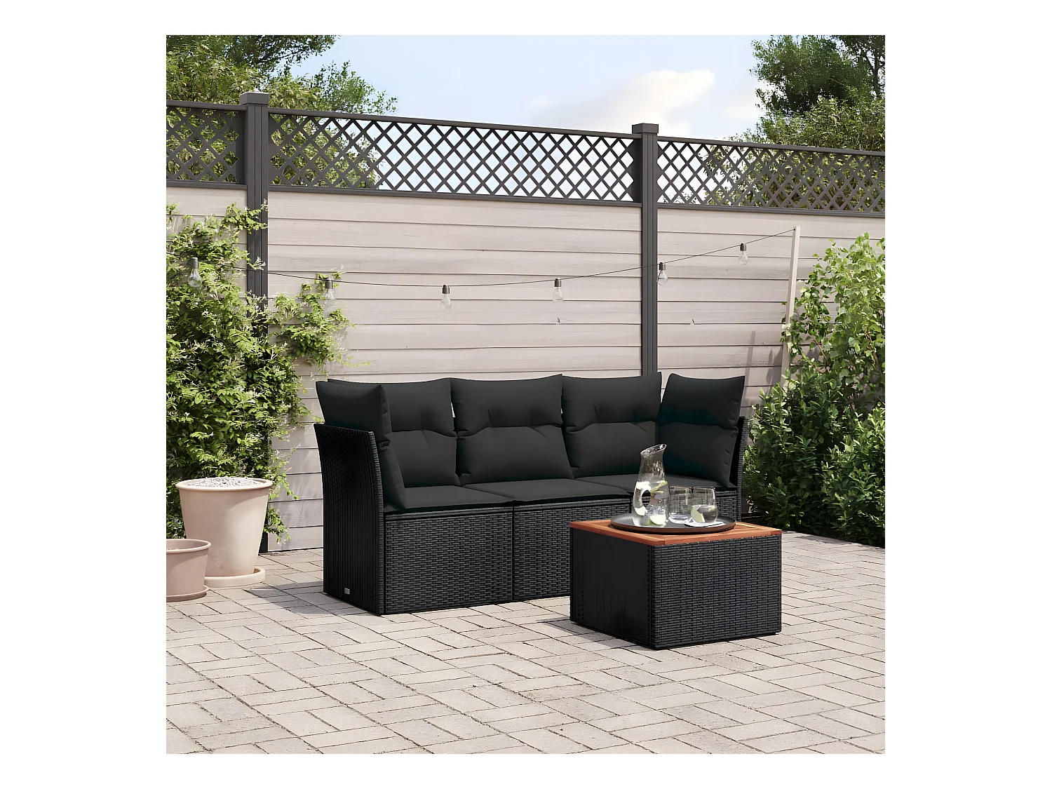 Set Divani da Giardino 4 pz con Cuscini Nero in Polyrattan