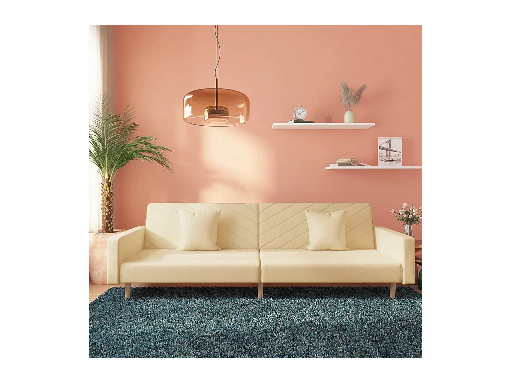 Canapé-lit à 2 places avec deux oreillers crème tissu