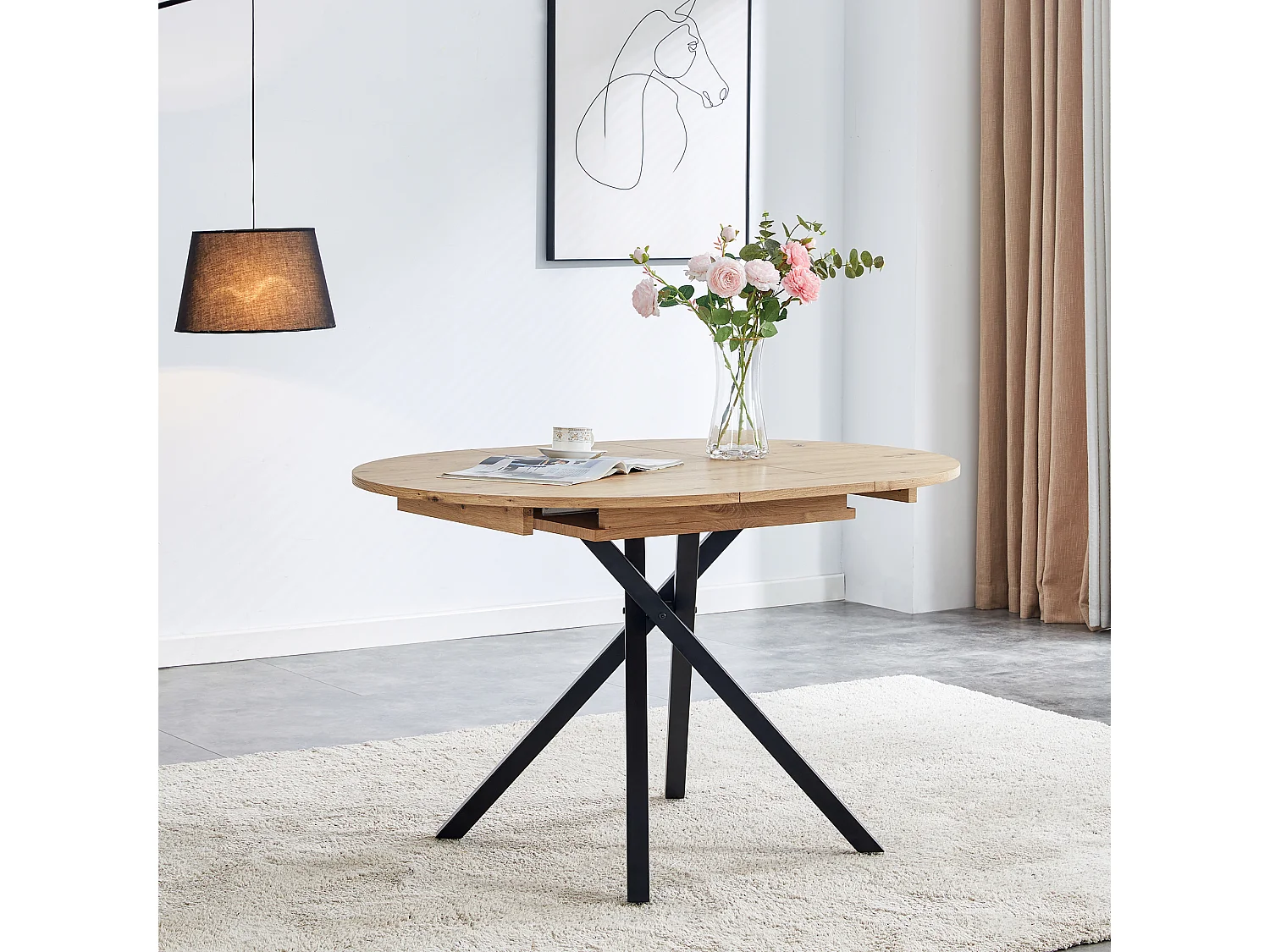 Ronde uitschuifbare eettafel in licht hout en zwart metalen poten Vaker 90 tot 120 cm