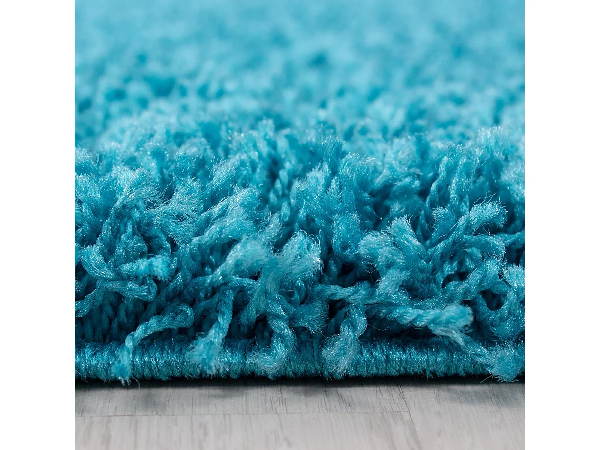 Tapis poils longs shaggy Ø120cm rond tissé bleu motif uni UNI C