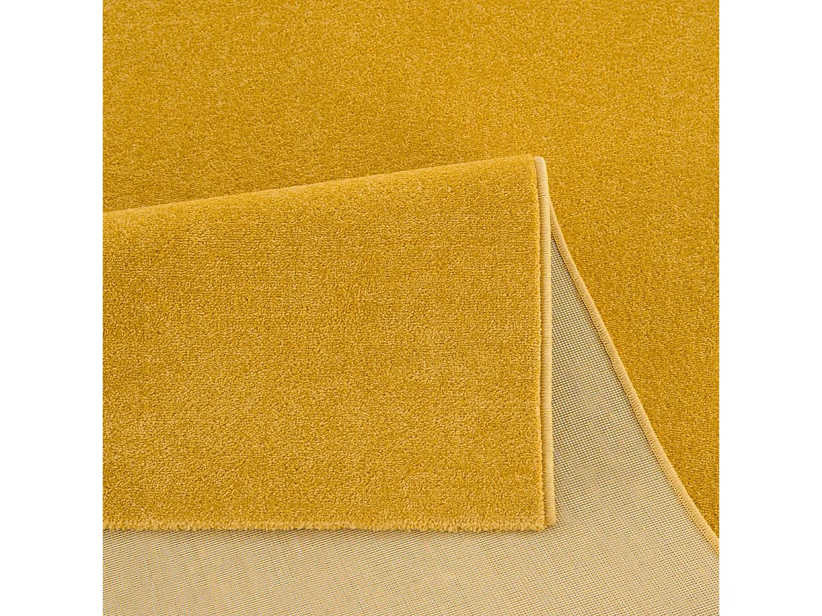 tapis salle de jeux Ø150cm tissé jaune rond motif uni NOSSA