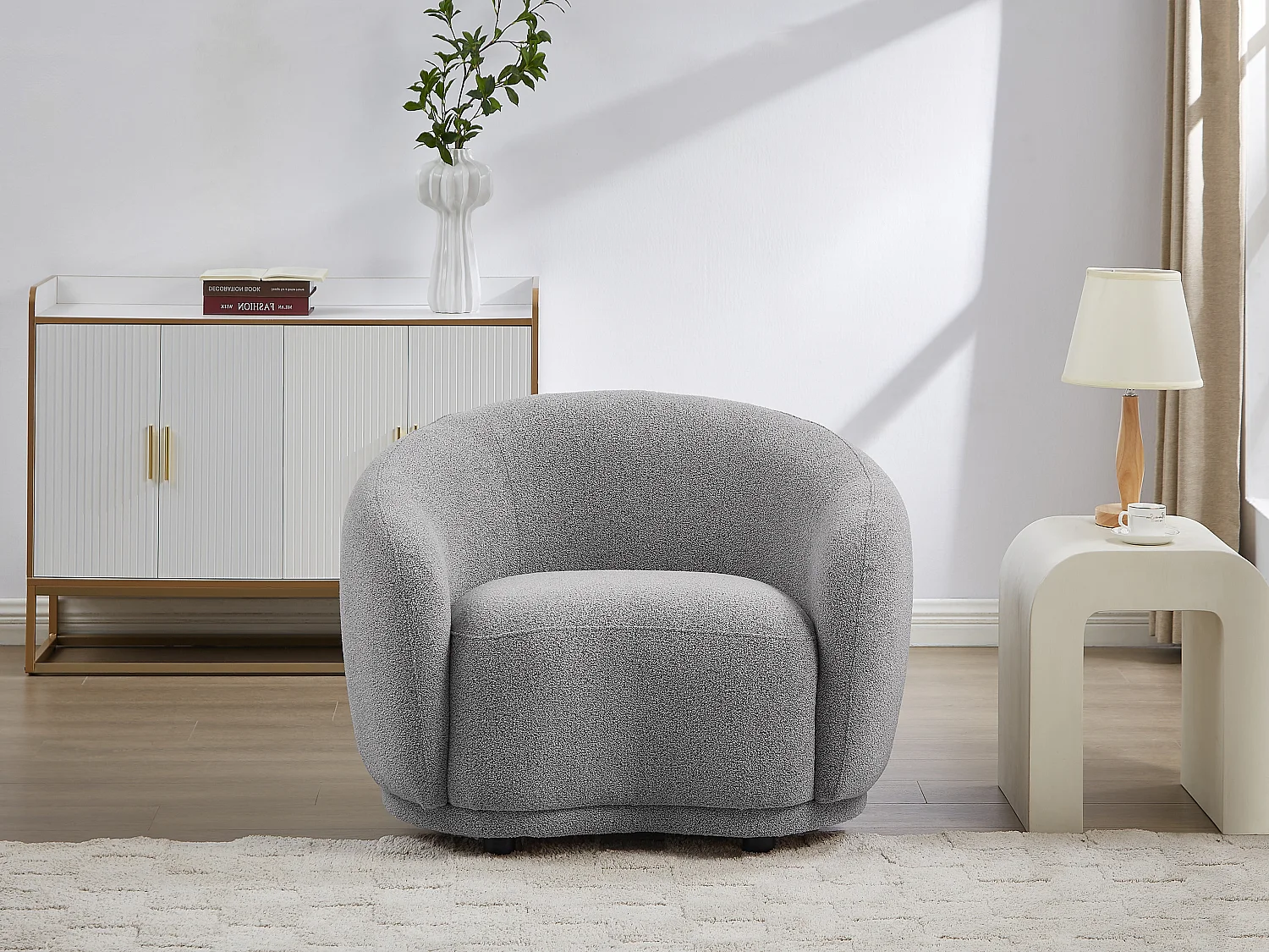 Fauteuil in grijs bouclé BOVANA van Pascal Morabito