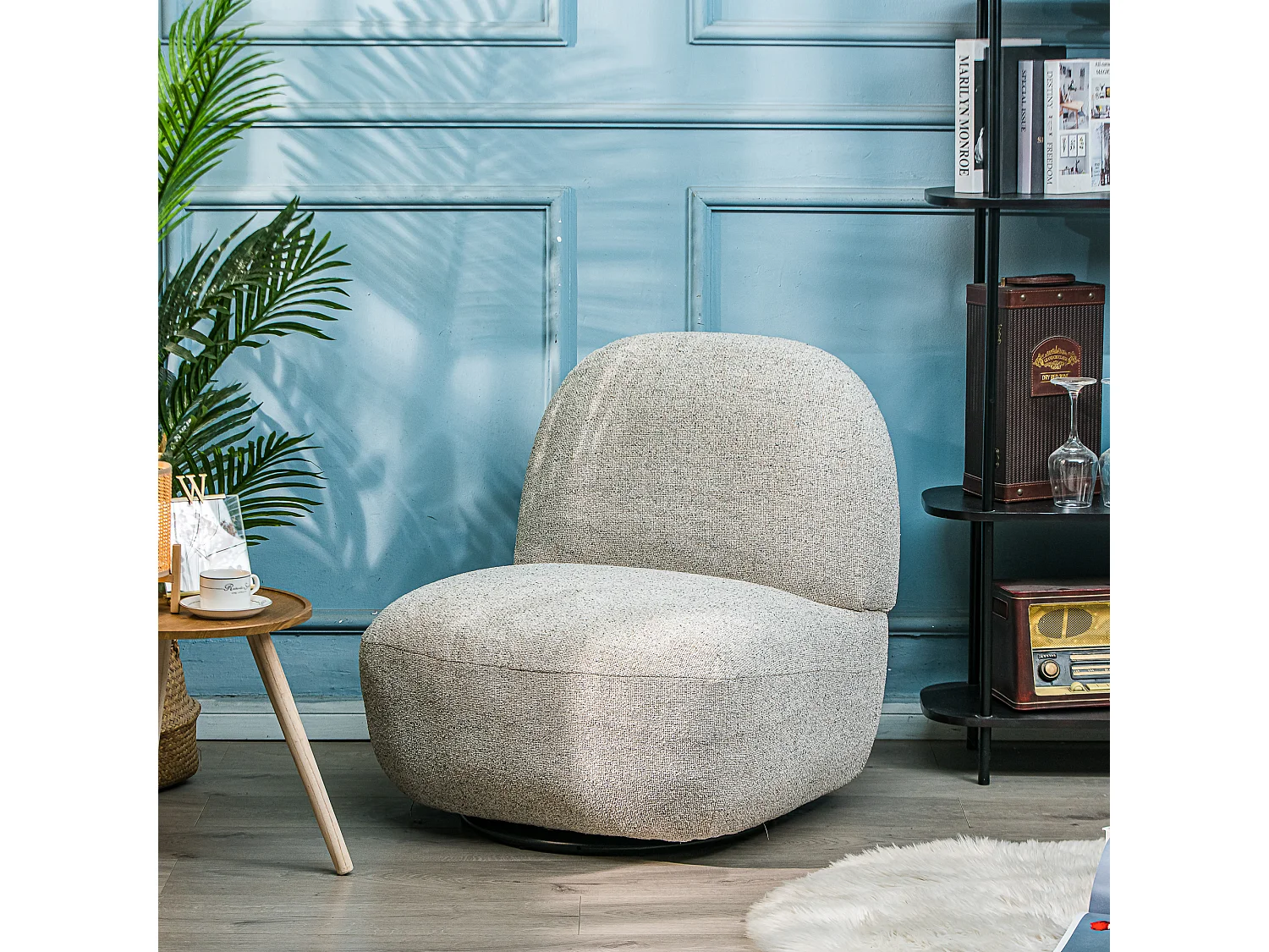 Fauteuil de salon pivotant en tissu gris