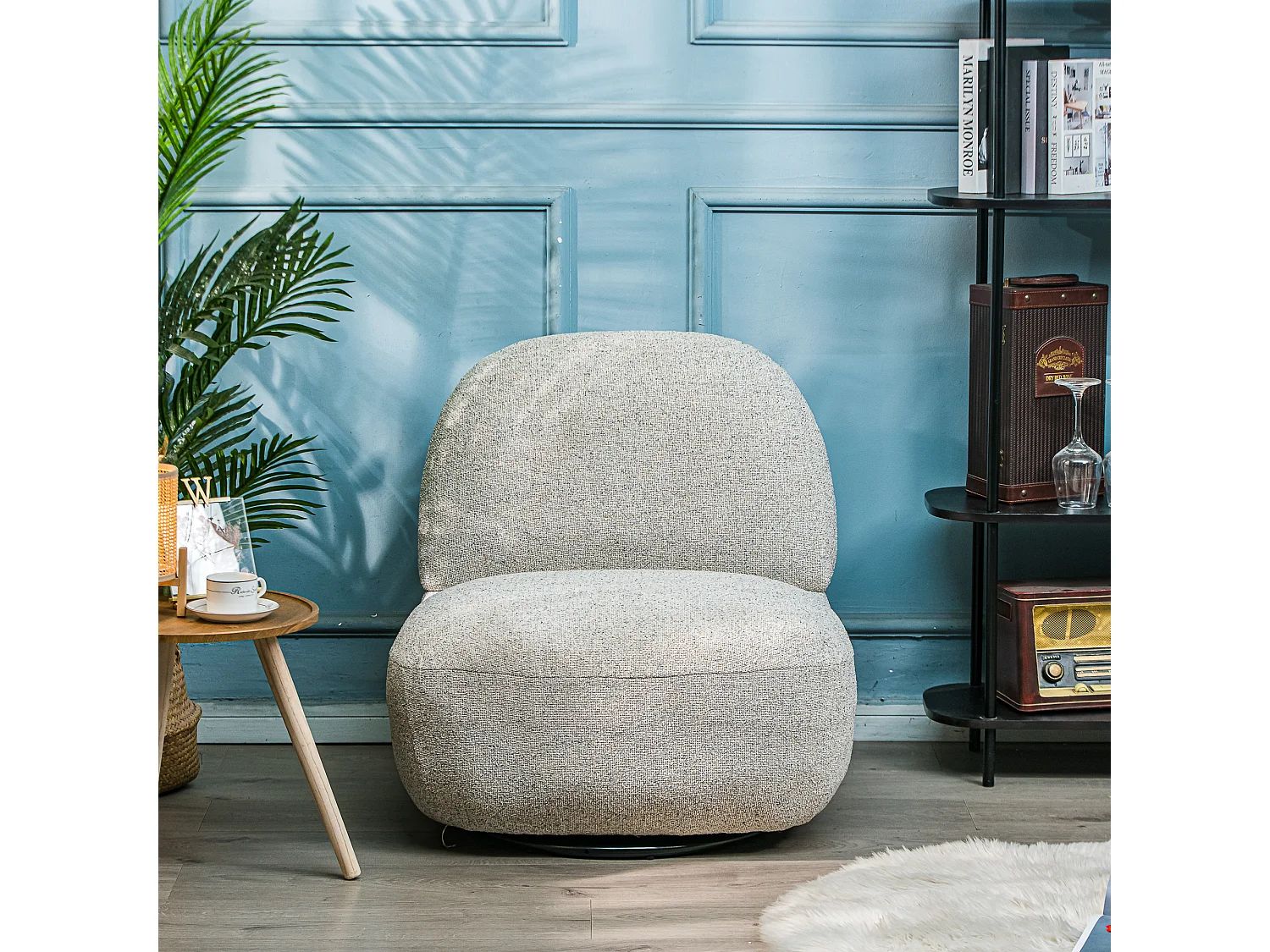 Fauteuil de salon pivotant en tissu gris