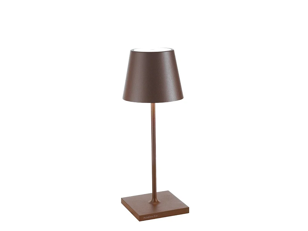 Poldina Pro Mini Corten LED table lamp, rechargeable and dimmable, with battery life of up to 12 hours.