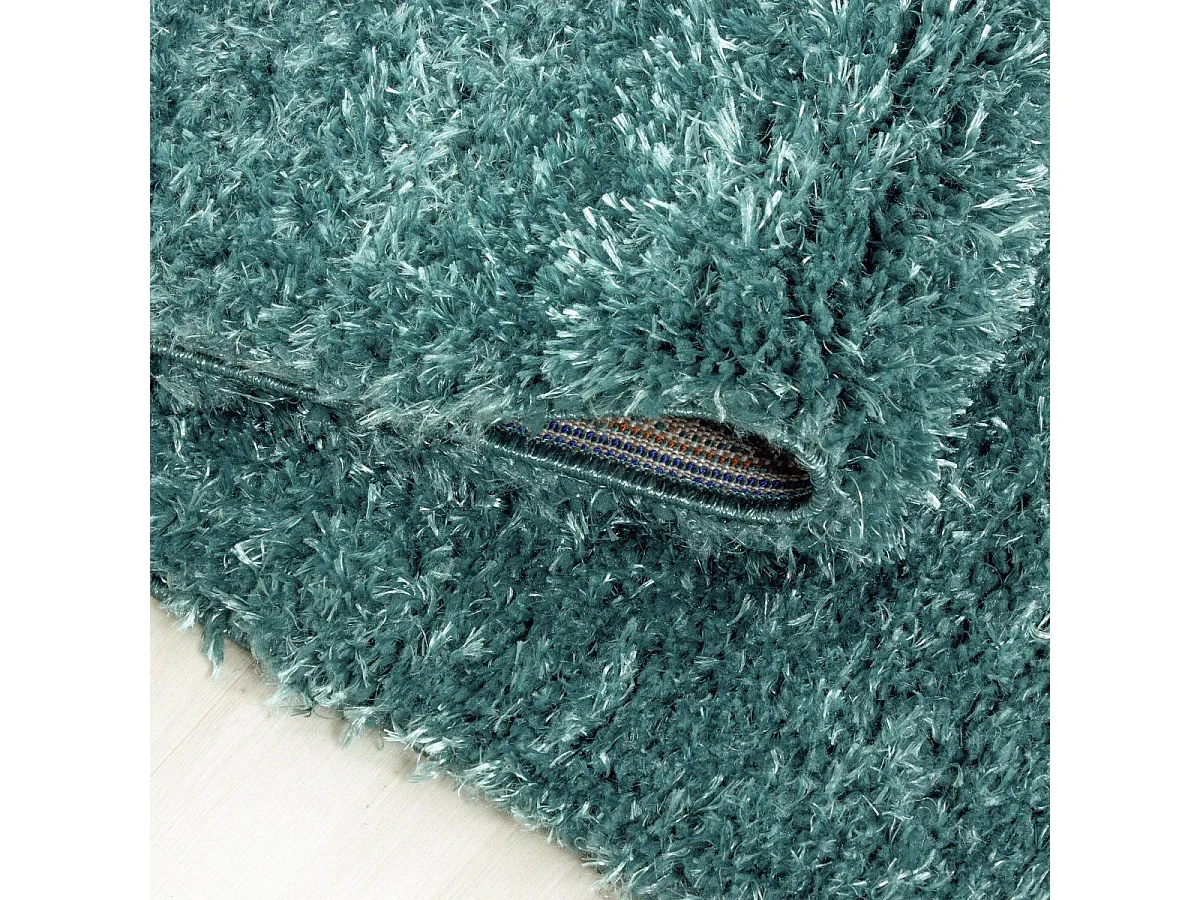 Tapis longs poils shaggy 140x200 rectangle tissé bleu et turquoise motif uni