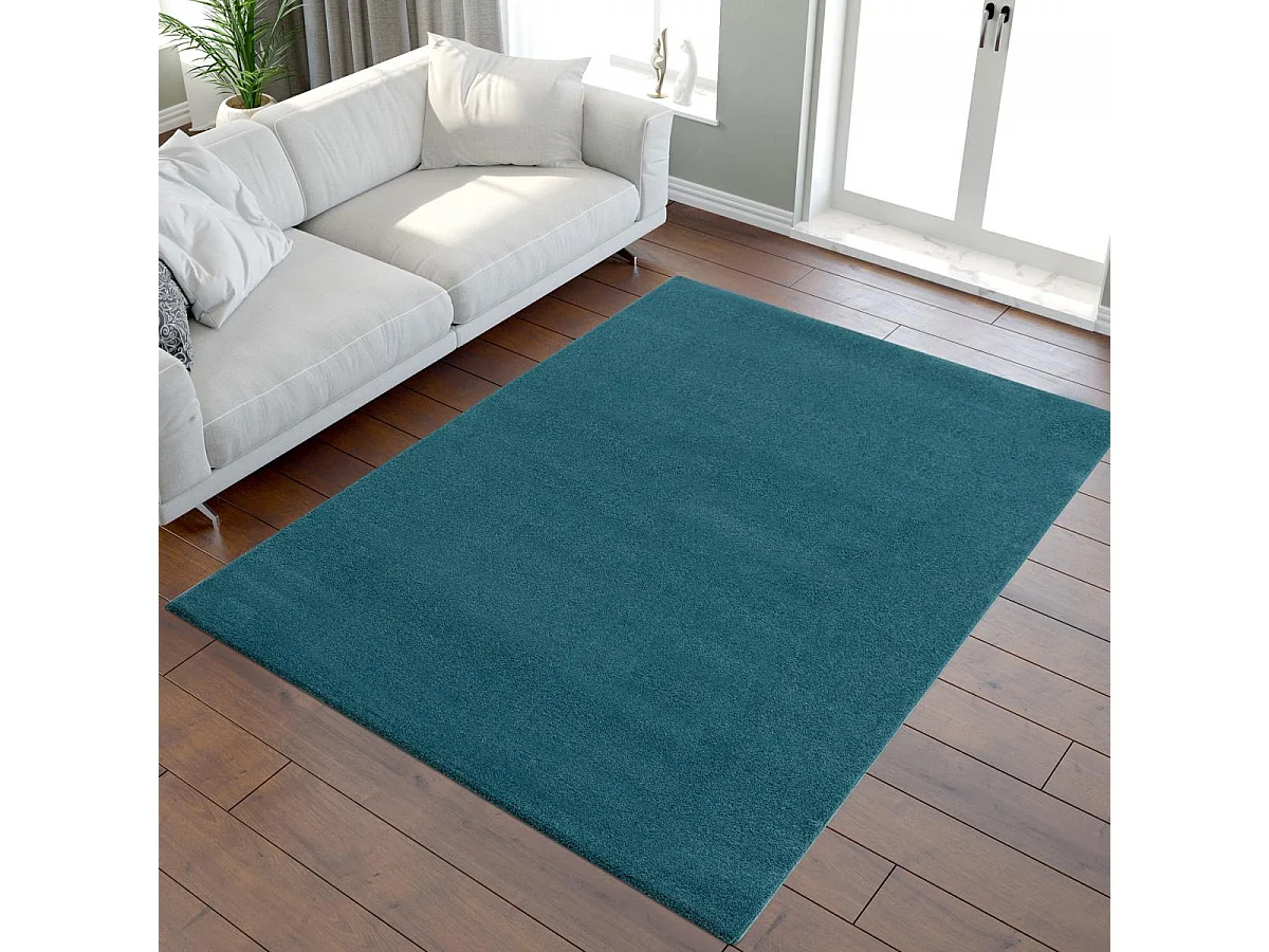 tapis salle de jeux Ø150cm tissé bleu foncé rond motif uni NOSSA