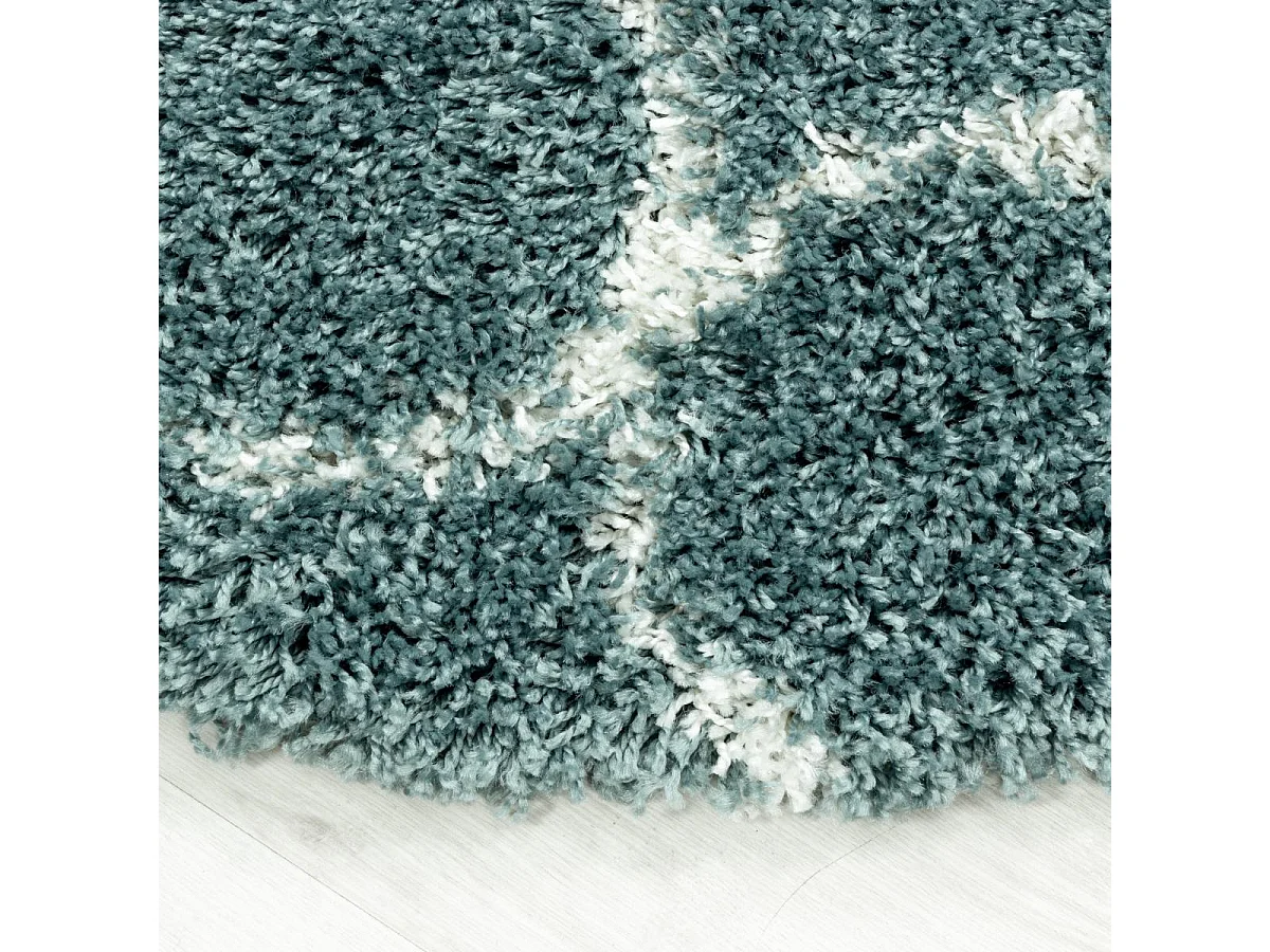Tapis shaggy Ø160cm rond tissé turquoise et crème motif scandinave SCANDINAV A