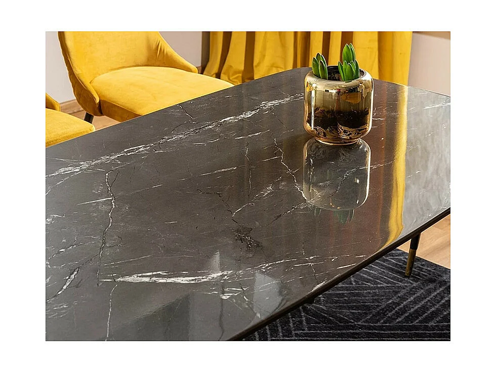 Mesa de comedor de diseño con aspecto de mármol negro y patas de metal Control