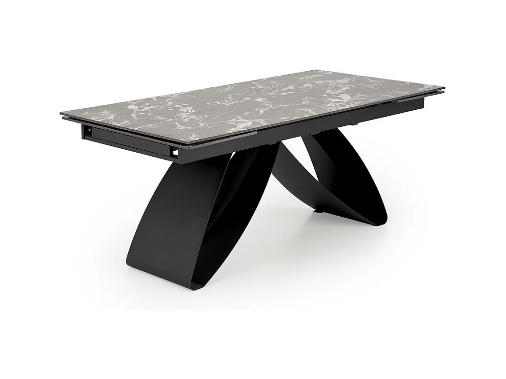 Mesa de comedor extensible Lizzy con tablero de mármol negro y pata central