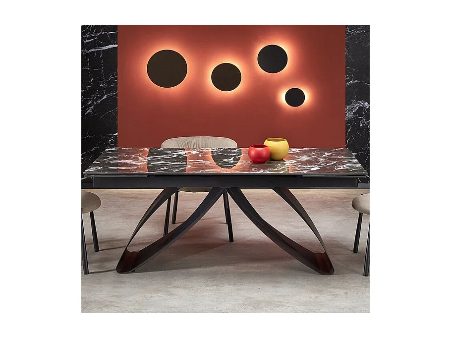 Mesa de comedor extensible Lizzy con tablero de mármol negro y pata central