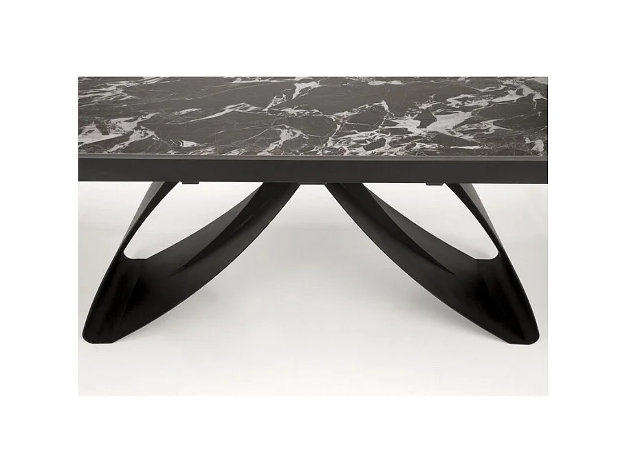 Mesa de comedor extensible Lizzy con tablero de mármol negro y pata central