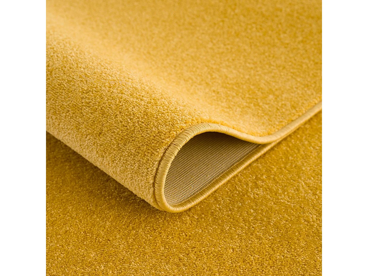tapis salle de bain Ø80cm tissé jaune rond motif uni NOSSA