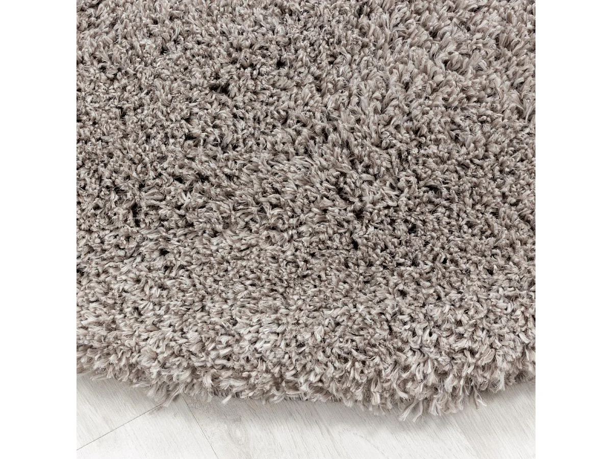 Tapis longs poils shaggy Ø200cm rond tissé beige motif uni UNI B