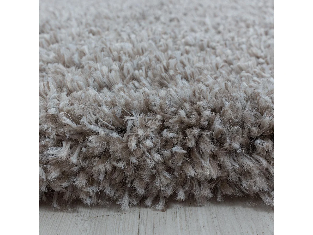 Tapis rond longs poils shaggy Ø200cm tissé beige motif uni UNI B