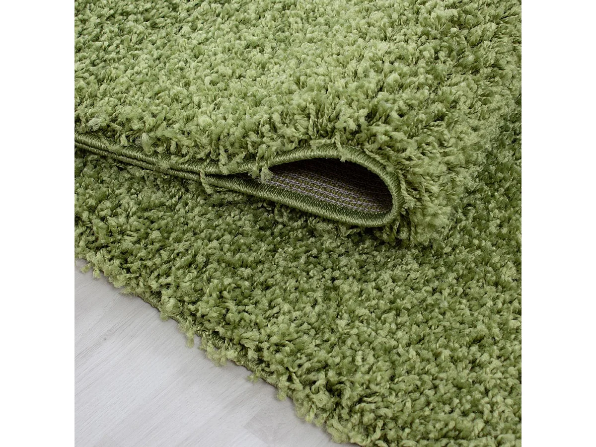 Tapis poils longs shaggy Ø120cm rond tissé vert motif uni UNI L