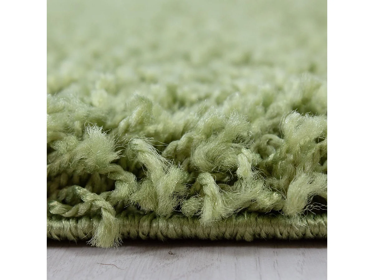 Tapis poils longs shaggy Ø120cm rond tissé vert motif uni UNI L