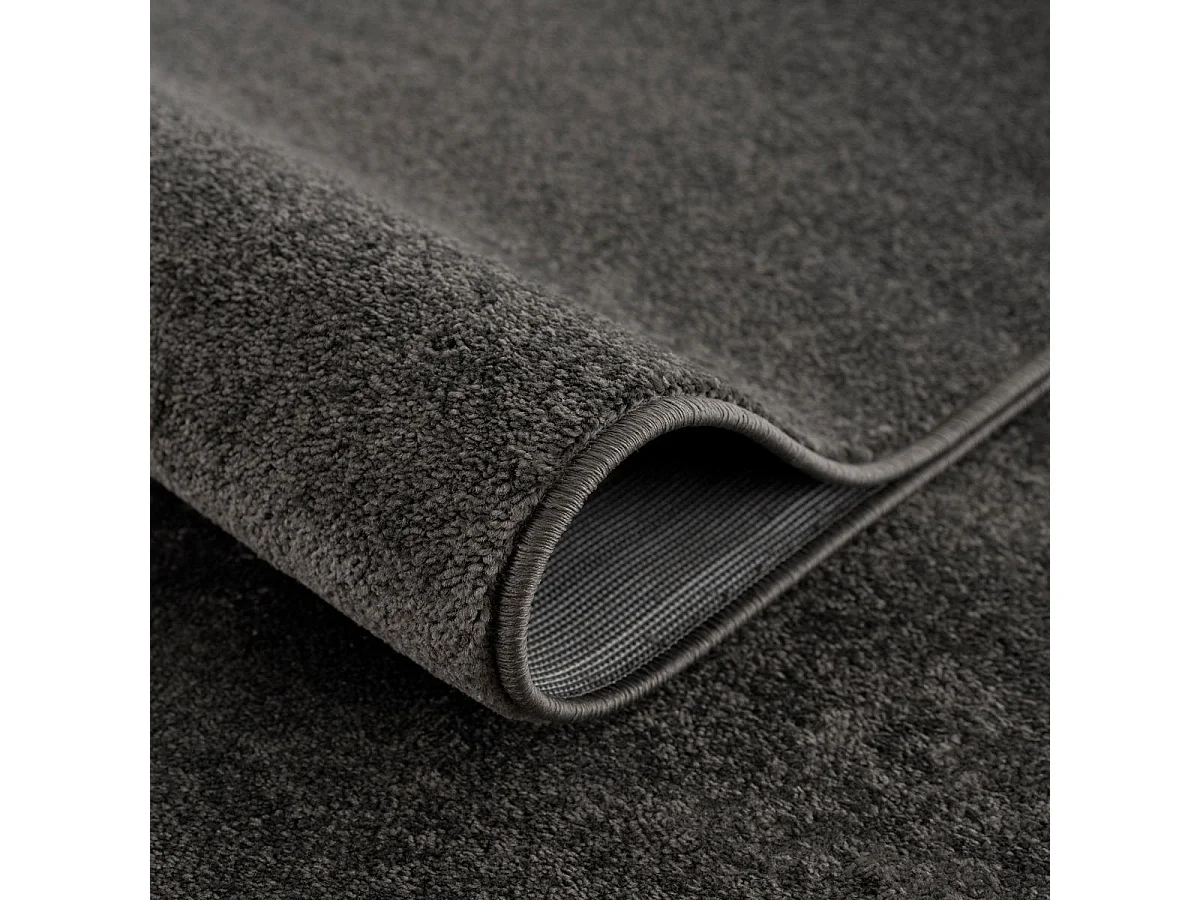 tapis salle de réception Ø120cm tissé gris foncé rond motif uni NOSSA