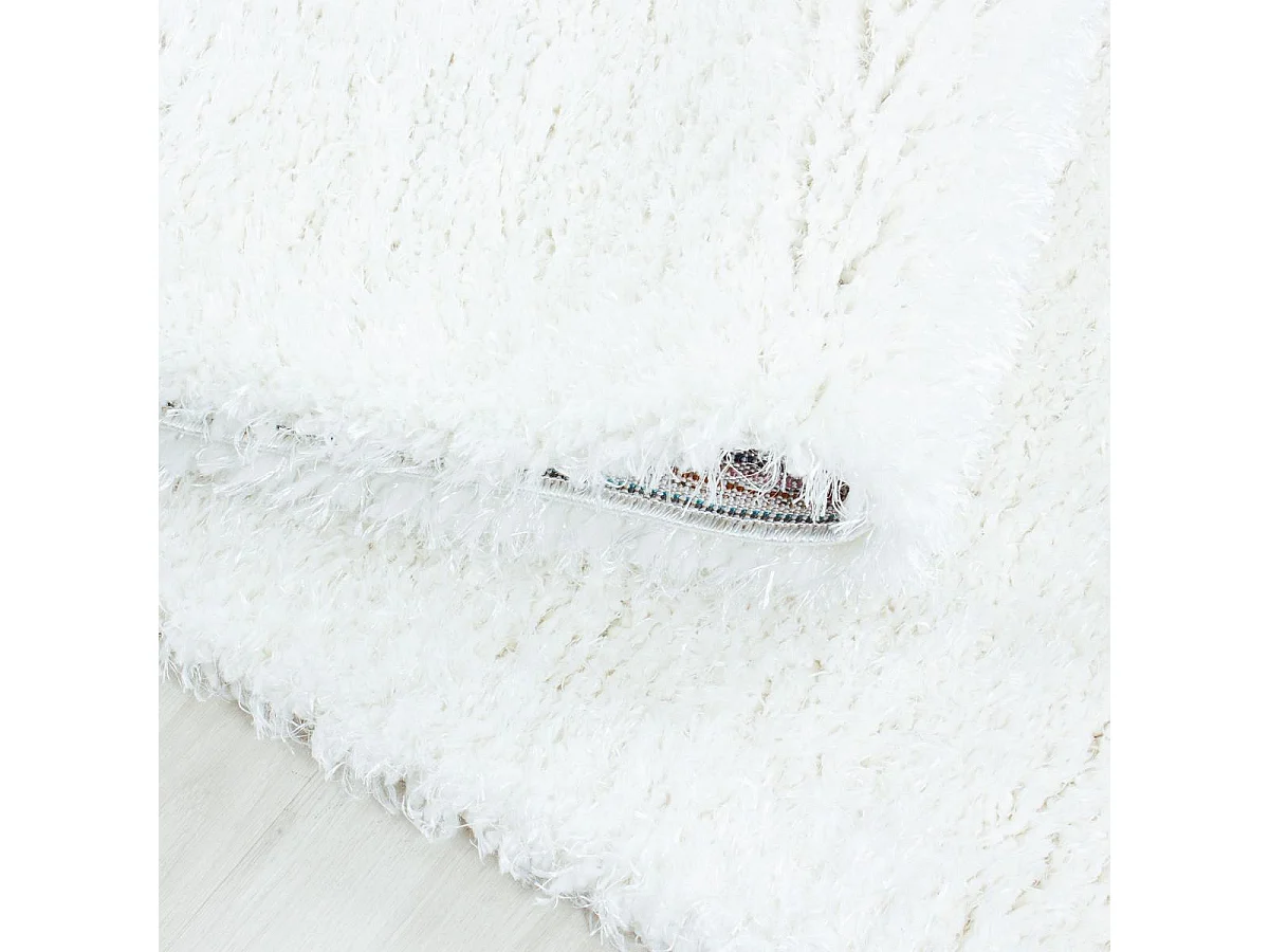 Tapis longs poils shaggy Ø120cm rond tissé blanc motif uni UNI A