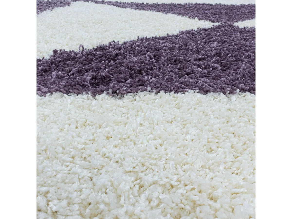 Tapis shaggy Ø120cm rond tissé violet et crème motif géométrique TRIANGLE A