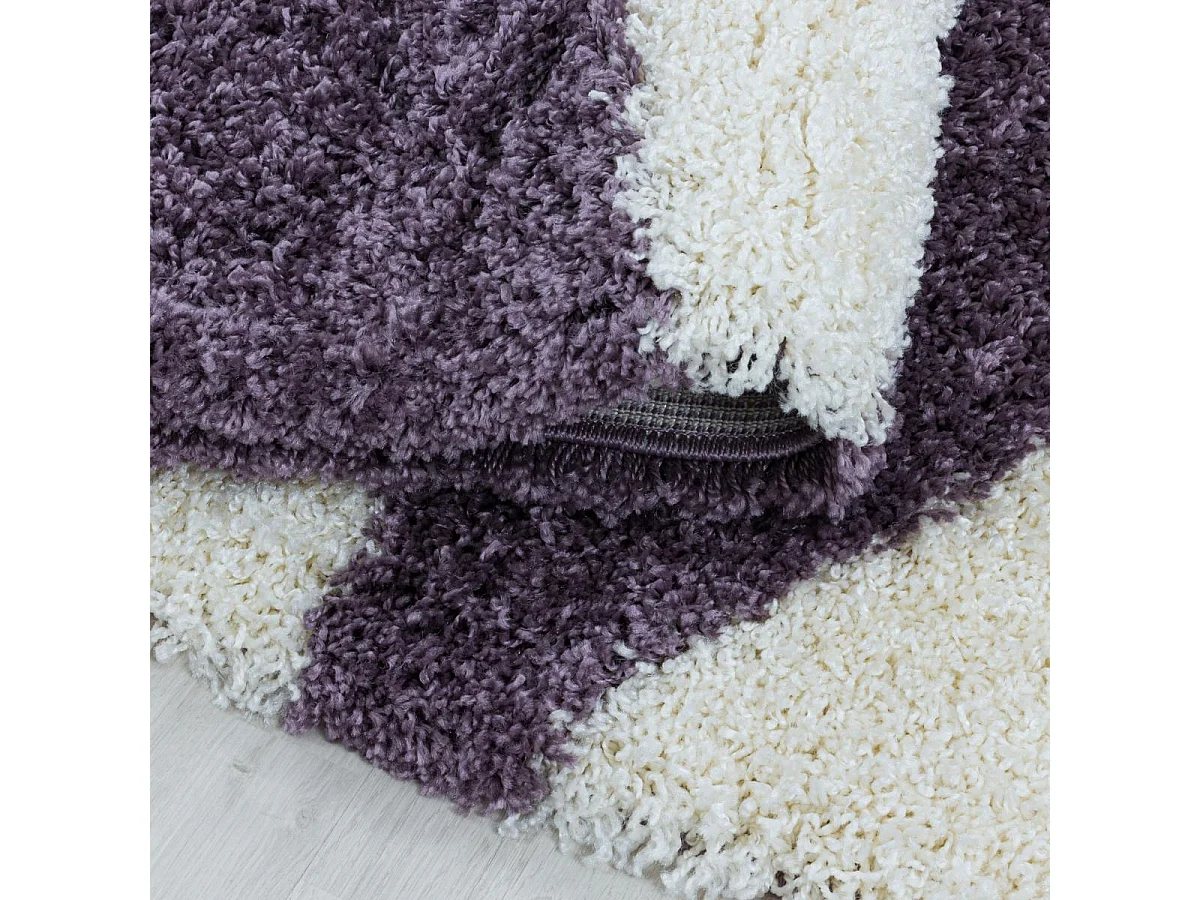 Tapis shaggy Ø120cm rond tissé violet et crème motif géométrique TRIANGLE A