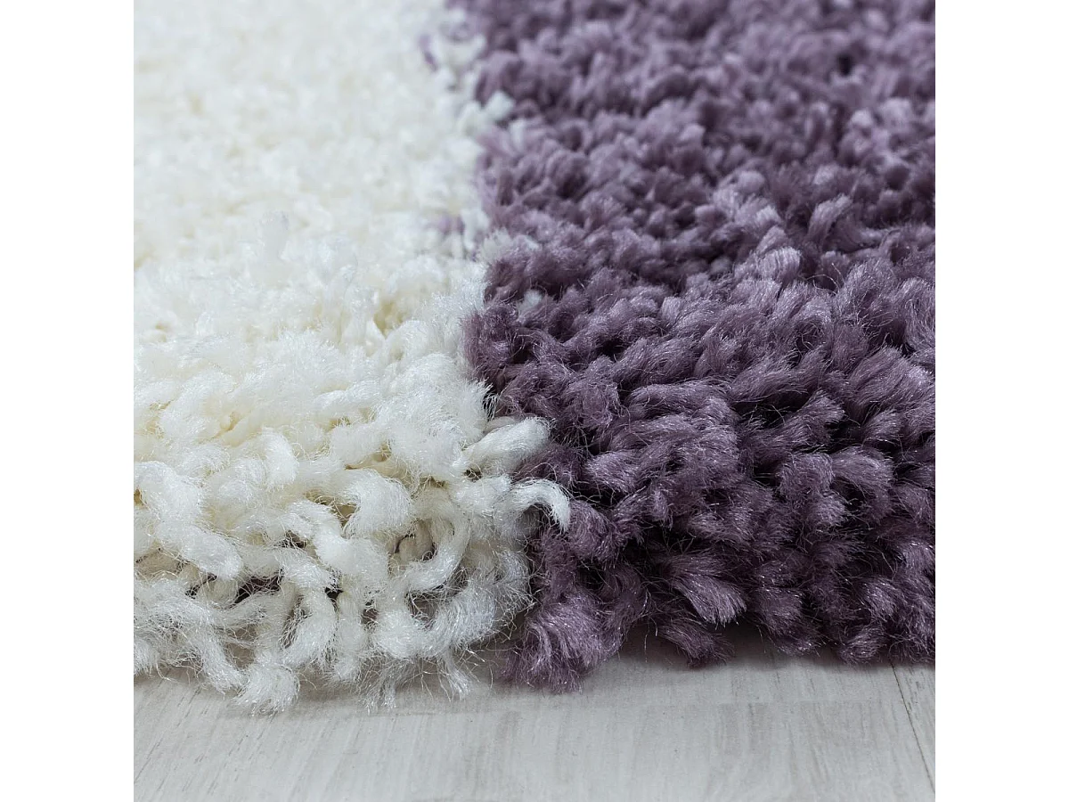 Tapis shaggy Ø120cm rond tissé violet et crème motif géométrique TRIANGLE A