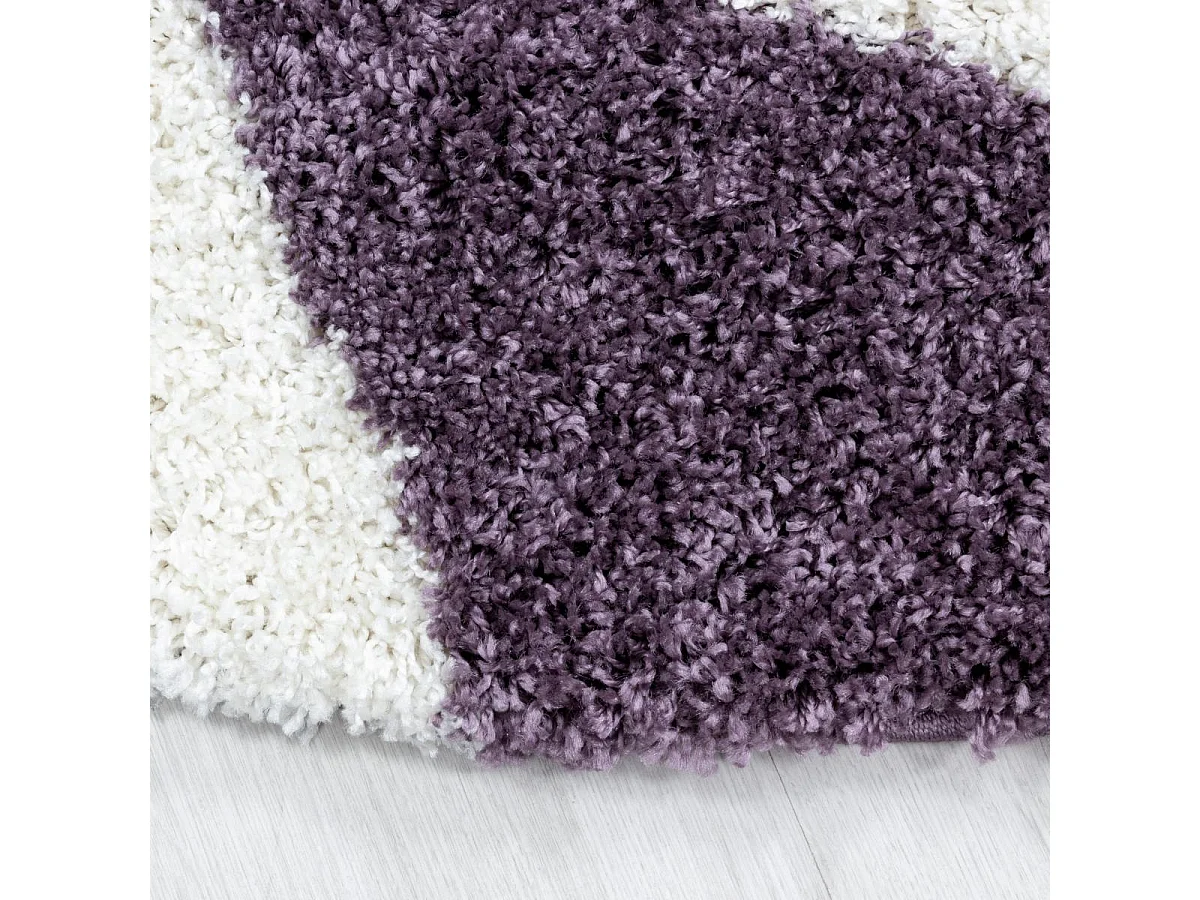 Tapis shaggy Ø120cm rond tissé violet et crème motif géométrique TRIANGLE A