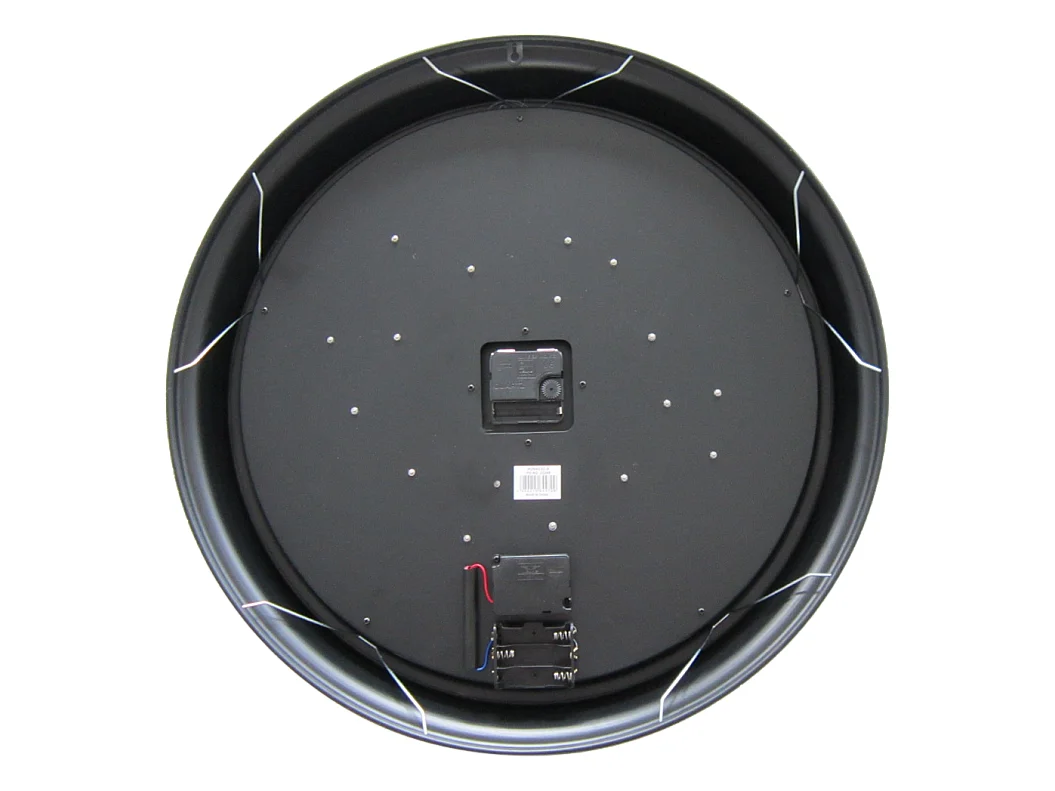 Horloge ronde noire et dorée mécanisme apparent 52x9x52cm